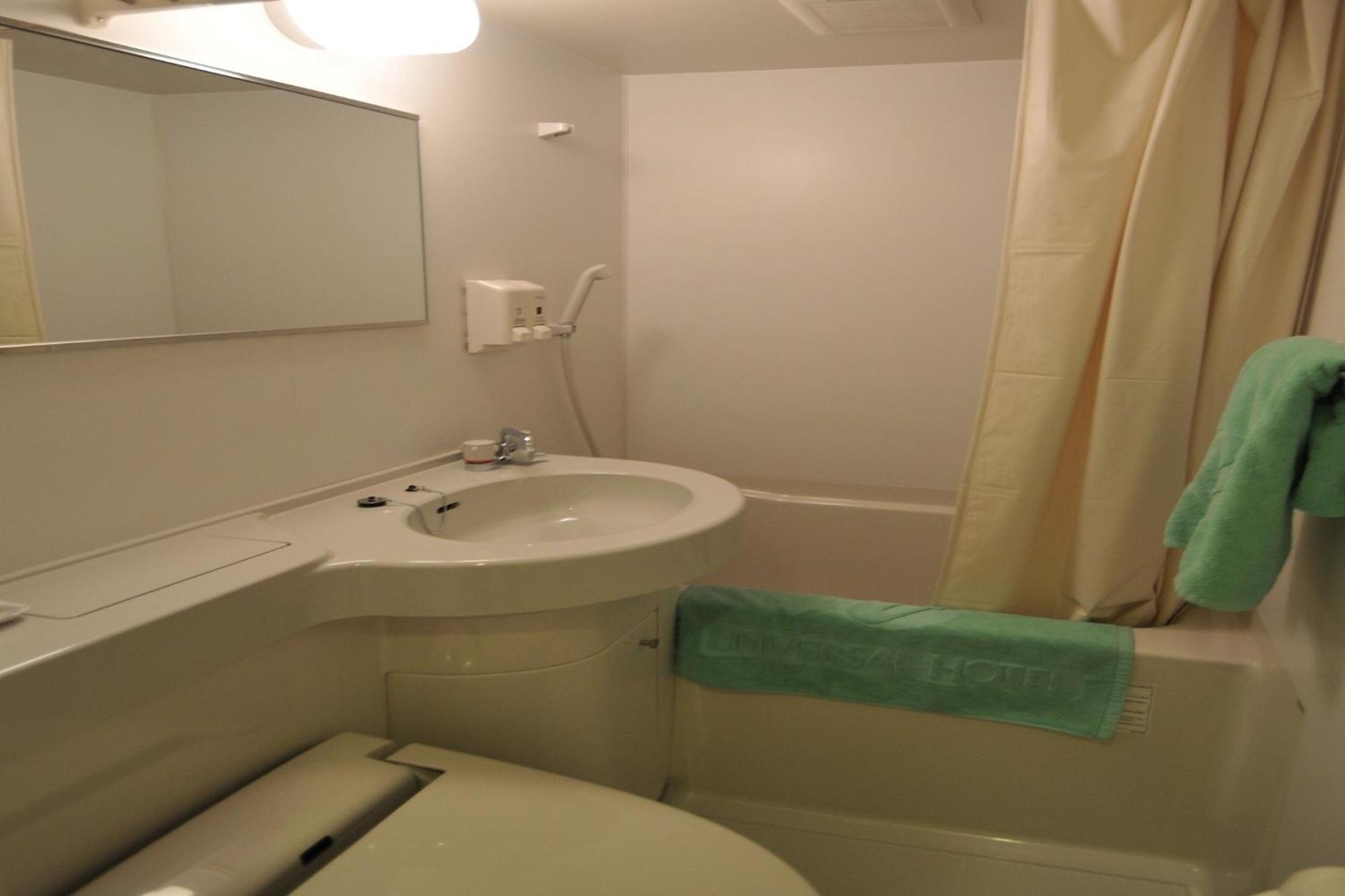 Okayama Ekimae Universal Hotel Екстер'єр фото